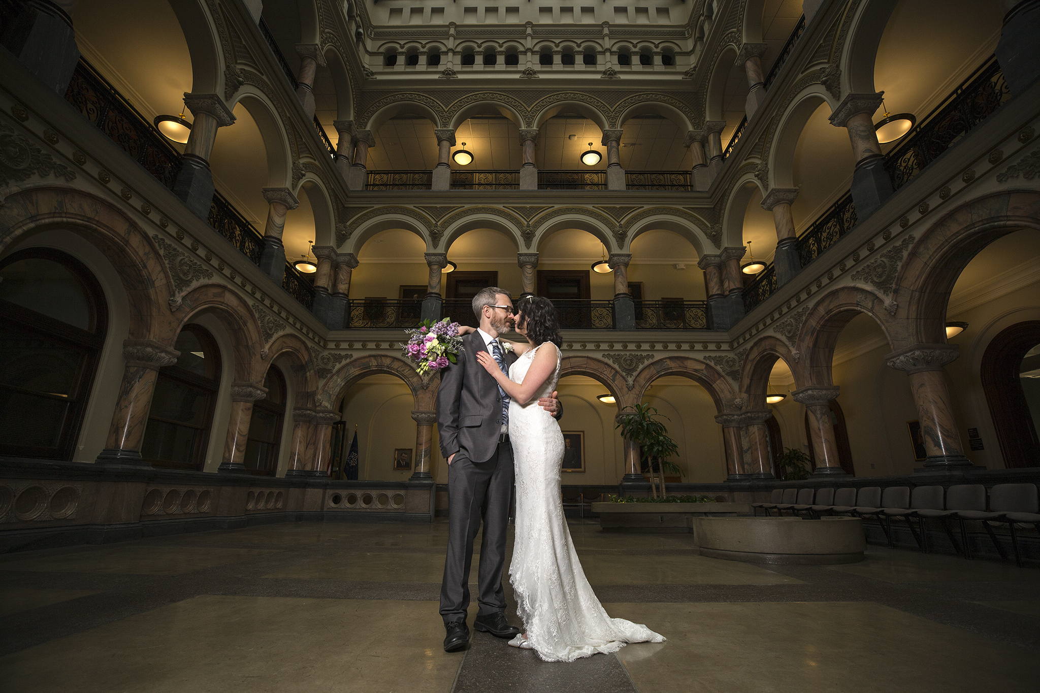 Bride and Groom getting married in the Rochester NY City Hall.