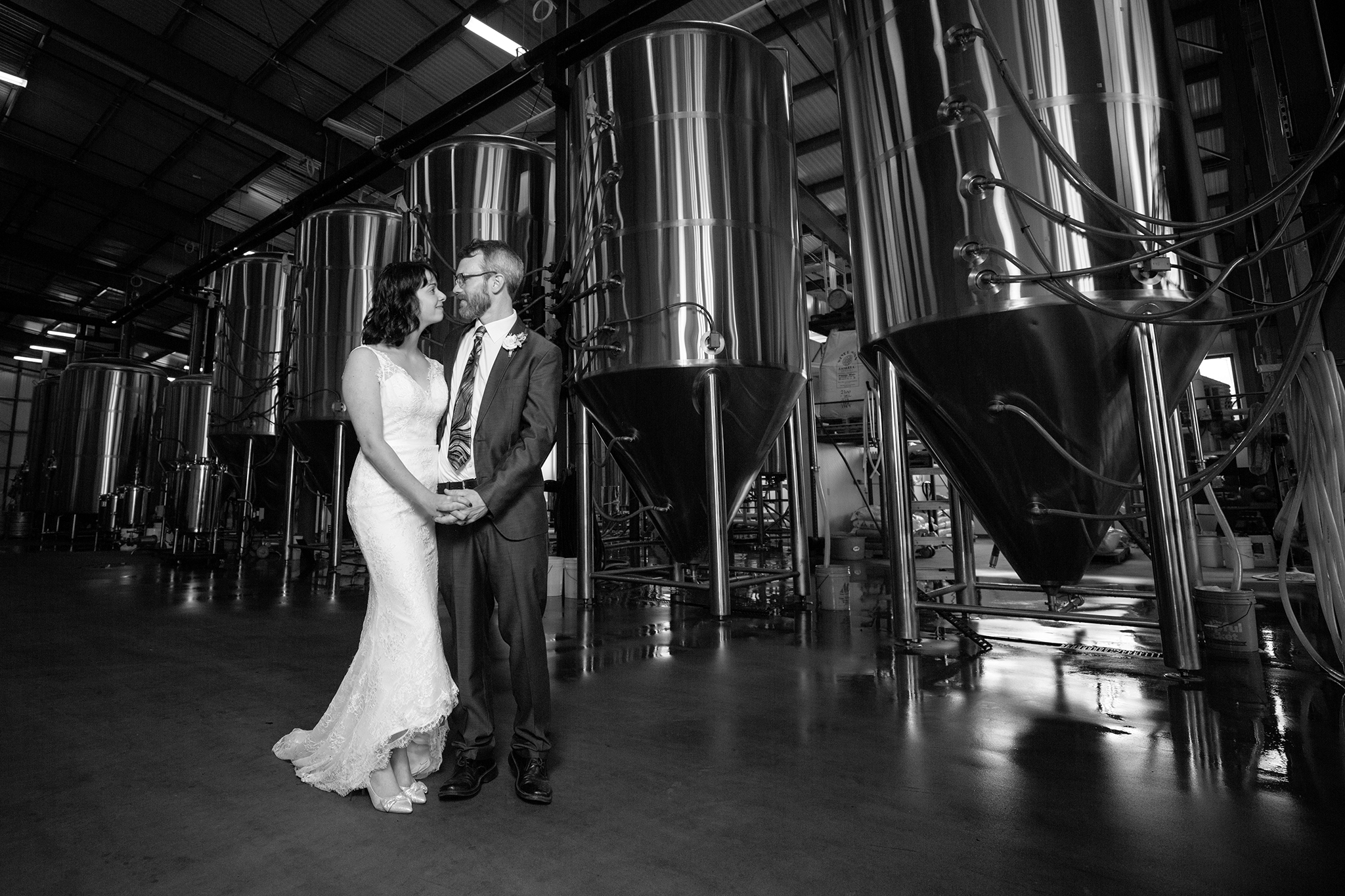 Bride and Groom at THree Heads Brewery in Rochester NY on their wedding day.